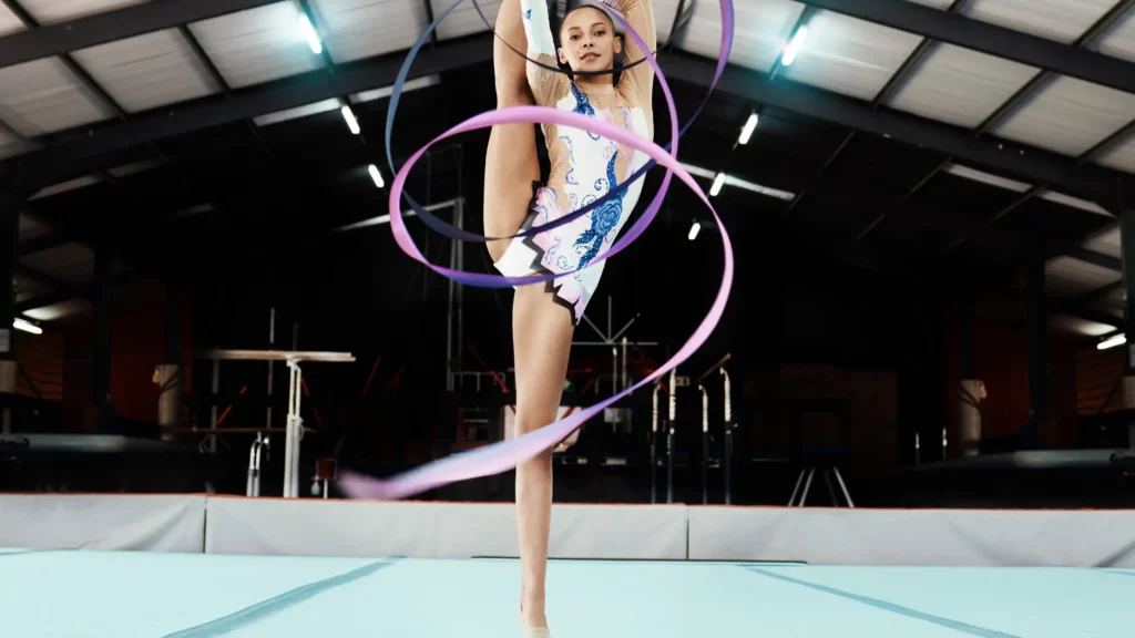 Artistic gymnastics platform with professional dancer
