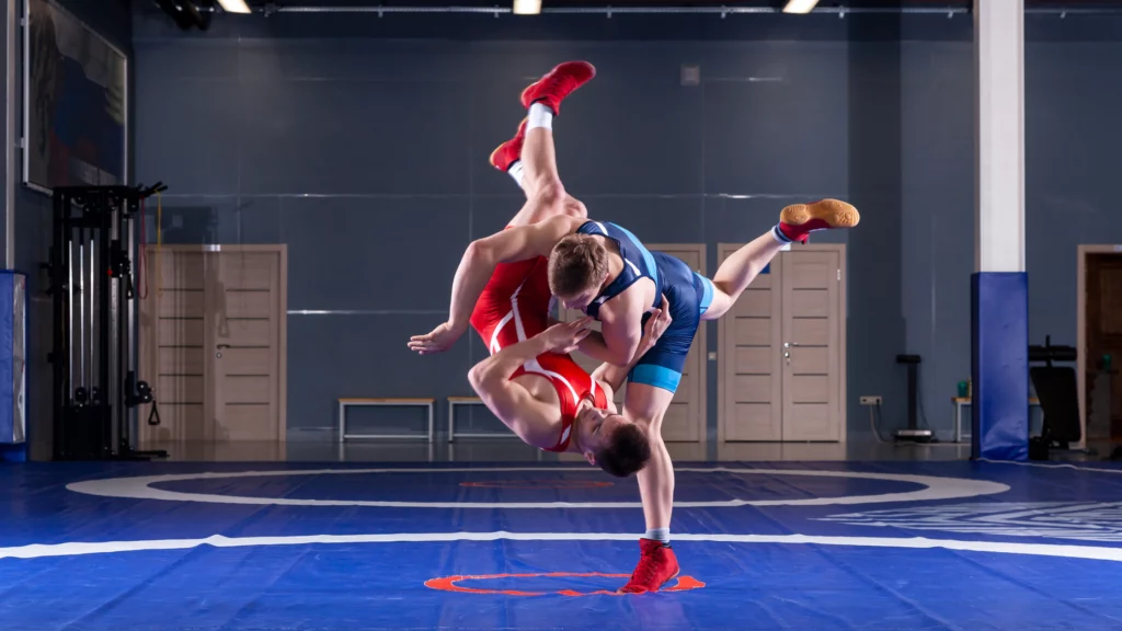 Two wrestlers training on the sumo tatami